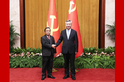 李希同老挝人革党中央政治局委员、中央纪委书记、国家监察总署署长坎潘举行会谈